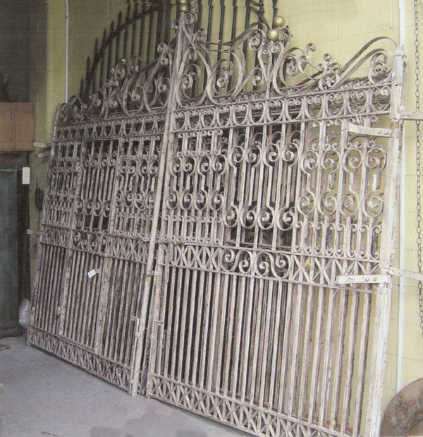 Wrought iron gates with pedestrian gate incorporated